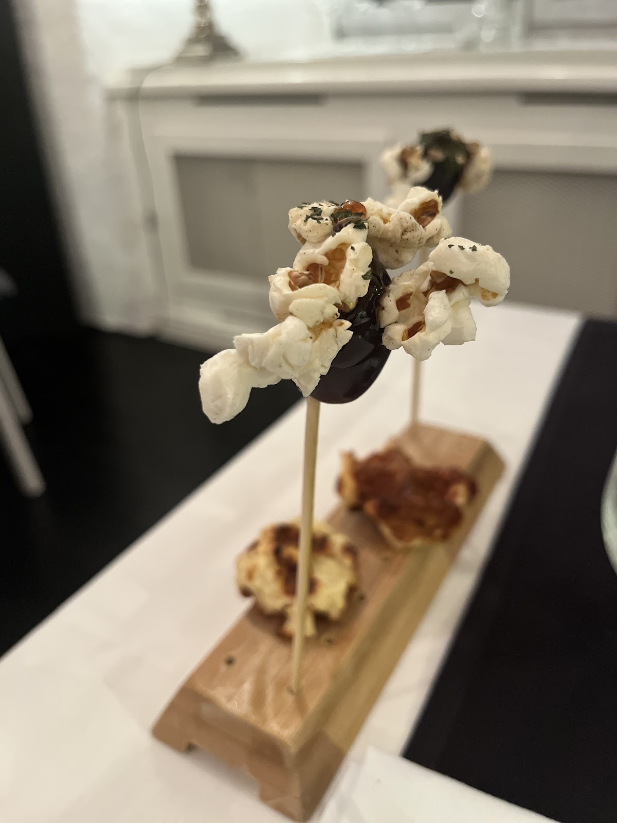 Amuse-bouche on a wooden board